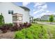 Street view of a well-maintained community with landscaped boulevards and sidewalks at 16200 Winfield Hall Dr, Charlotte, NC 28273