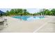 Large community swimming pool with lounge chairs and umbrellas for residents to enjoy at 16200 Winfield Hall Dr, Charlotte, NC 28273