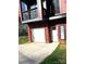 A modern two-story home featuring a garage and a front door, with a concrete driveway at 211 S Webb St, Gastonia, NC 28052