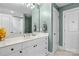 Bright bathroom featuring a white vanity, decorative fixtures, and fresh, neutral wall color at 21812 Chapel Way # 20, Cornelius, NC 28031