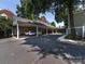 Spacious carport providing covered parking for multiple vehicles, enhancing convenience and protection at 2310 Roswell Ave # H, Charlotte, NC 28207