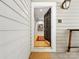 A welcoming entrance through the front door, revealing a glimpse of the beautifully decorated interior at 2310 Roswell Ave # H, Charlotte, NC 28207