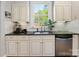 Charming kitchen featuring granite countertops, stainless steel appliances and generous storage at 2310 Roswell Ave # H, Charlotte, NC 28207