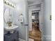 Bright bathroom showcasing a vanity with modern fixtures at 2503 Roswell Ave # 208, Charlotte, NC 28209