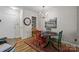 Cozy dining area featuring a round table, colorful chairs, and decorative lighting at 2503 Roswell Ave # 208, Charlotte, NC 28209