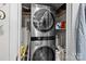 Laundry features a stainless steel, stacked washer and dryer at 2503 Roswell Ave # 208, Charlotte, NC 28209
