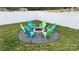 Inviting fire pit area with Adirondack chairs for cozy outdoor gatherings, surrounded by a white picket fence at 2766 Sherrills Stream Dr, Sherrills Ford, NC 28673