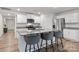 Stylish kitchen with white cabinets, granite countertops, stainless steel appliances, and a large center island with seating at 2766 Sherrills Stream Dr, Sherrills Ford, NC 28673