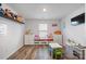 This playroom features wood-look floors, a variety of toys and games, and plenty of storage at 2766 Sherrills Stream Dr, Sherrills Ford, NC 28673