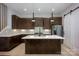Stylish kitchen with a center island, stainless steel appliances, and a modern sliding door at 3020 Georgia Ave, Charlotte, NC 28205