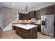 Gourmet kitchen with stainless steel appliances and island with seating at 3020 Georgia Ave, Charlotte, NC 28205