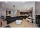 Spacious open-concept living area with an integrated kitchen and modern design elements at 3020 Georgia Ave, Charlotte, NC 28205