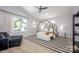 Main bedroom with modern furnishings and large windows providing natural light at 3020 Georgia Ave, Charlotte, NC 28205