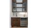 Stylish wet bar area with wine fridge and custom cabinets at 3020 Georgia Ave, Charlotte, NC 28205