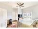 Bright bedroom with natural light, wood floors, and a cozy atmosphere at 310 N Central Ave, Landis, NC 28088