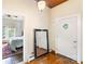 Bright entryway featuring hardwood floors and access to the bedroom at 310 N Central Ave, Landis, NC 28088