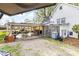 Covered patio area for outdoor seating and parking, offering ample space for relaxation and storage at 310 N Central Ave, Landis, NC 28088