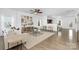Bright, open-concept living room with hardwood floors, stylish furnishings, and plenty of natural light at 314 Contentment Dr # 192B, Locust, NC 28097