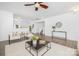 Spacious living room with hardwood floors, neutral decor, a modern ceiling fan and an open floorplan at 314 Contentment Dr # 192B, Locust, NC 28097