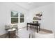 Bright home office with large window, desk, chair, and neutral decor creating a welcoming and productive workspace at 314 Contentment Dr # 192B, Locust, NC 28097