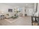 Bright living area with neutral tones, modern furniture, and plenty of natural light at 336 B Lincoln St, Concord, NC 28025