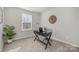 Modern office setup with a sleek desk, comfortable chair, and ample natural light at 336 B Lincoln St, Concord, NC 28025