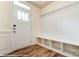 Bright foyer with hardwood floors, coat rack and storage, and natural light at 4217 Black Ct # 194, Harrisburg, NC 28075