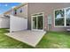 Private outdoor patio with a privacy fence and green grass, ideal for relaxing or entertaining at 4217 Black Ct # 194, Harrisburg, NC 28075