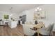 Open concept featuring kitchen and dining area, perfect for Gathering meals at 4217 Whispering Oaks Dr, Charlotte, NC 28213