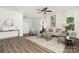 Bright living room with wood floors, neutral decor, and modern furnishings at 4217 Whispering Oaks Dr, Charlotte, NC 28213