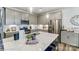 Stylish kitchen featuring stainless steel appliances, granite countertops, pendant lights, and ample counter space at 4229 Black Ct # 196, Harrisburg, NC 28075