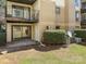Condo exterior features patio, small yard and mature landscaping at 4814 Spring Lake Dr # B, Charlotte, NC 28212