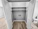 Open closet featuring shelves and new flooring at 4814 Spring Lake Dr # B, Charlotte, NC 28212