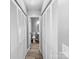 Hallway between closets and a bathroom at 4814 Spring Lake Dr # B, Charlotte, NC 28212