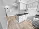 Open floor plan featuring the kitchen and adjacent eating and living areas at 4814 Spring Lake Dr # B, Charlotte, NC 28212