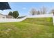 Green backyard with a privacy fence creating a private outdoor space at 4917 Spruce Peak Rd, Charlotte, NC 28278