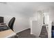 Spacious bedroom featuring neutral paint, plush carpeting, and an open hallway at 4917 Spruce Peak Rd, Charlotte, NC 28278
