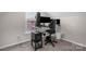 Bedroom featuring neutral paint, plush carpeting, and a well-lit workspace at 4917 Spruce Peak Rd, Charlotte, NC 28278