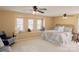 Spacious bedroom with a ceiling fan and a cozy window seat at 513 Buttercup Way, Fort Mill, SC 29715