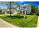 Charming two-story home with beautiful lawn, landscaping, and an attached two-car garage at 513 Buttercup Way, Fort Mill, SC 29715