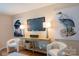 Intimate living room featuring modern artwork and neutral tones at 513 Buttercup Way, Fort Mill, SC 29715
