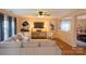 Inviting living room featuring neutral decor and an open view of the dining area at 513 Buttercup Way, Fort Mill, SC 29715