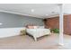 Basement bedroom with whitewashed bed frame and a rustic brick wall accent at 529 Langley Rd, Lancaster, SC 29720