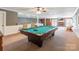 Basement features a pool table, wet bar, lounge area, and fireplace at 529 Langley Rd, Lancaster, SC 29720