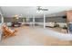 Open basement space includes a pool table, wet bar, and lounging space at 529 Langley Rd, Lancaster, SC 29720
