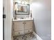 Bathroom showcases a granite countertop, vanity with storage and decorative tile floor at 529 Langley Rd, Lancaster, SC 29720