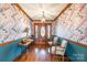 Elegant hallway with decorative wallpaper, stylish furnishings, and a grand front door at 529 Langley Rd, Lancaster, SC 29720