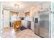 Well-lit kitchen with stainless steel appliances, granite countertops, and tile flooring at 529 Langley Rd, Lancaster, SC 29720