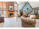 Spacious living room with a brick fireplace, large windows, and comfortable seating at 529 Langley Rd, Lancaster, SC 29720