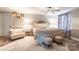 Cozy main bedroom with stylish furniture, neutral colors, and plush carpeting at 529 Langley Rd, Lancaster, SC 29720